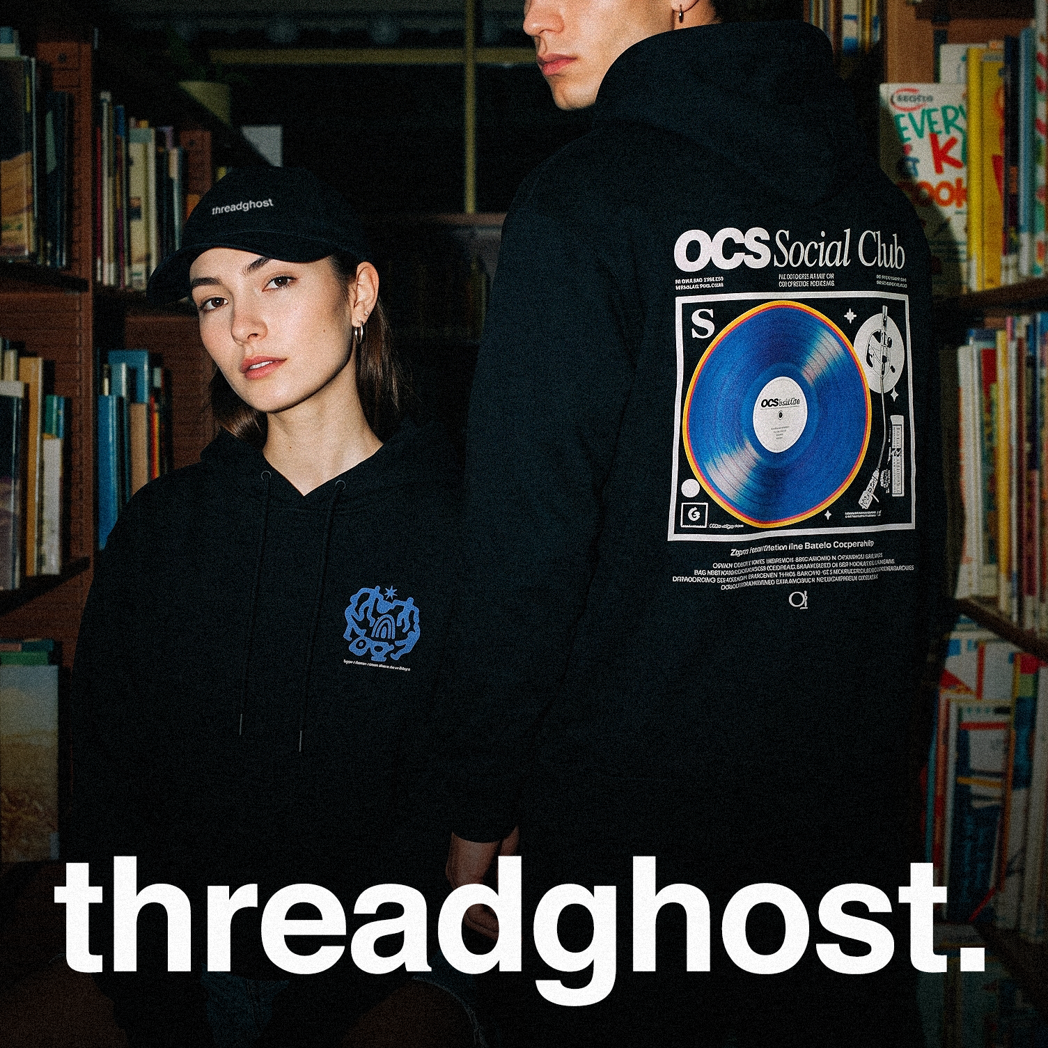 A black hoodie with a full-back DTG print and a left-chest logo